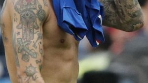 China proh&iacute;be hacerse nuevos tatuajes a los jugadores de la selecci&oacute;n
